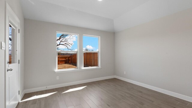 1736 River Bend Rd, Burleson, TX 76028 - unfurnished room with wood finished floors and baseboards