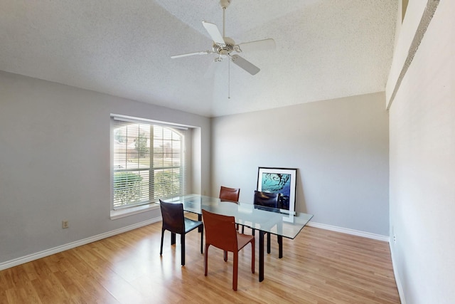 824 Ingleside Dr, Plano, TX 75075 - dining space with light wood finished floors, vaulted ceiling, a ceiling fan, a textured ceiling, and baseboards