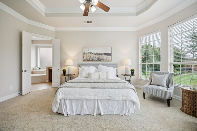 5809 Sterling Trl, Mckinney, TX 75071 - carpeted bedroom with a raised ceiling, crown molding, ensuite bath, and a ceiling fan