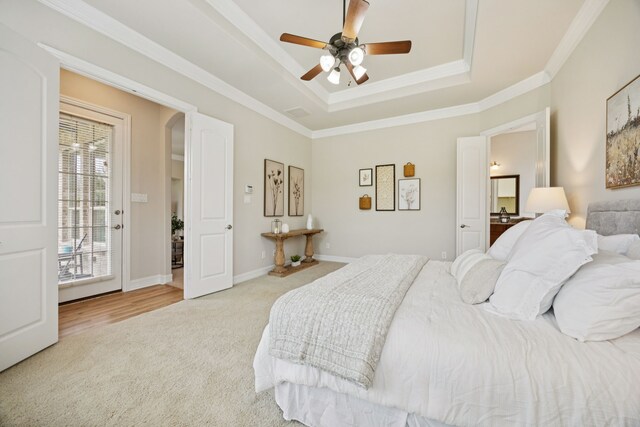 5809 Sterling Trl, Mckinney, TX 75071 - carpeted bedroom with a tray ceiling, crown molding, ceiling fan, and access to outside