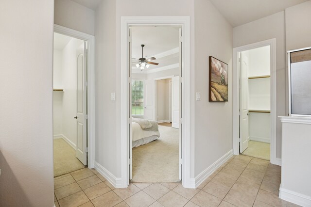 5809 Sterling Trl, Mckinney, TX 75071 - hallway with light colored carpet and light tile patterned floors
