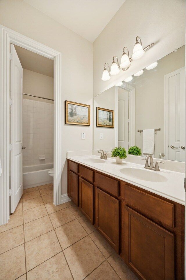 5809 Sterling Trl, Mckinney, TX 75071 - bathroom featuring double vanity, tile patterned flooring, and shower / washtub combination