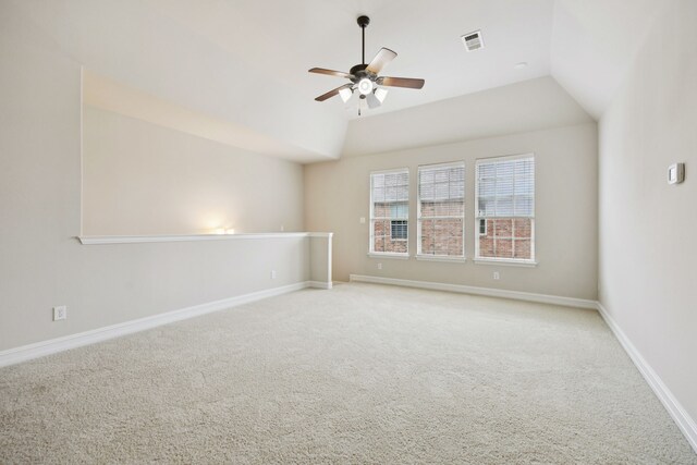 5809 Sterling Trl, Mckinney, TX 75071 - empty room featuring a ceiling fan, carpet floors, and vaulted ceiling