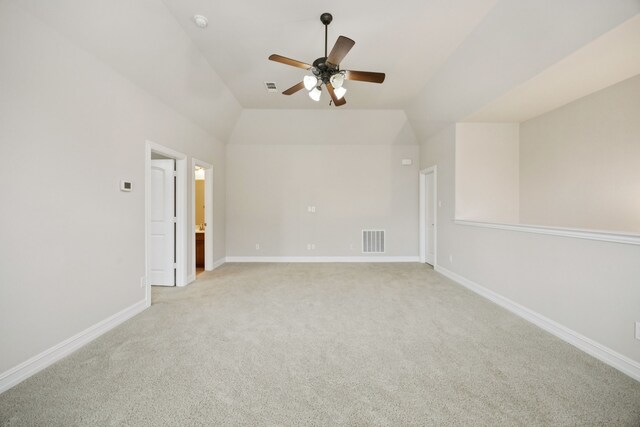 5809 Sterling Trl, Mckinney, TX 75071 - spare room with light carpet, a ceiling fan, and lofted ceiling