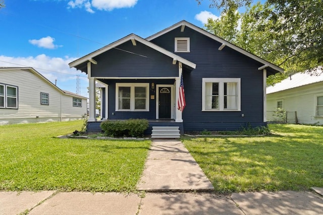408 W Trinity St, Groesbeck, TX 76642 - view of front of property featuring covered porch and a front yard