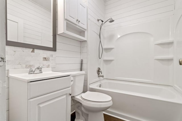 408 W Trinity St, Groesbeck, TX 76642 - full bath featuring wooden walls, vanity, and bathtub / shower combination