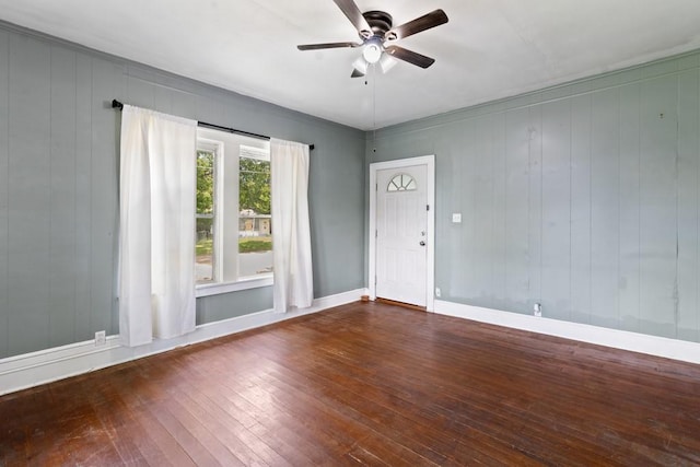 408 W Trinity St, Groesbeck, TX 76642 - empty room with a ceiling fan and hardwood / wood-style floors