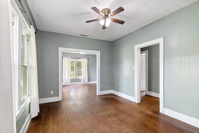 408 W Trinity St, Groesbeck, TX 76642 - unfurnished room with wood-type flooring and a ceiling fan