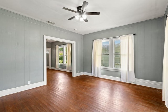 408 W Trinity St, Groesbeck, TX 76642 - spare room with a ceiling fan and hardwood / wood-style floors