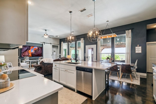 2011 Twin Creeks Cir, Pilot Point, TX 76258 - kitchen with stainless steel dishwasher, a sink, a barn door, a chandelier, and open floor plan