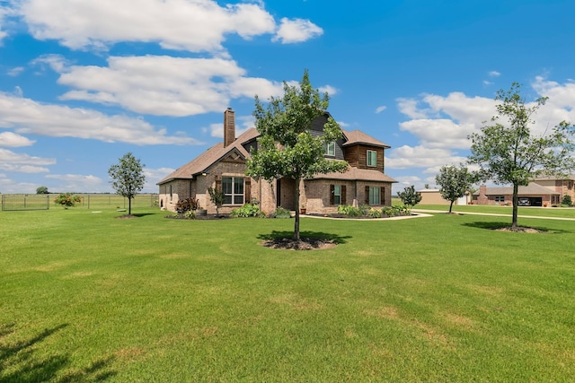 2011 Twin Creeks Cir, Pilot Point, TX 76258 - rear view of property with a chimney and brick siding