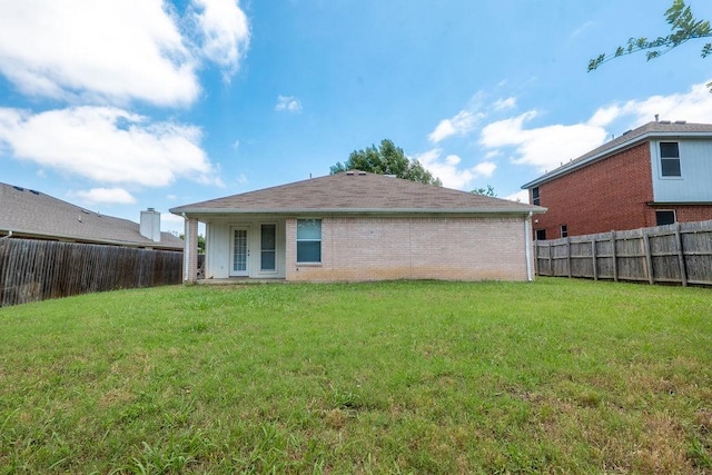 6104 Brookfall Dr, Arlington, TX 76018 - back of house featuring brick siding