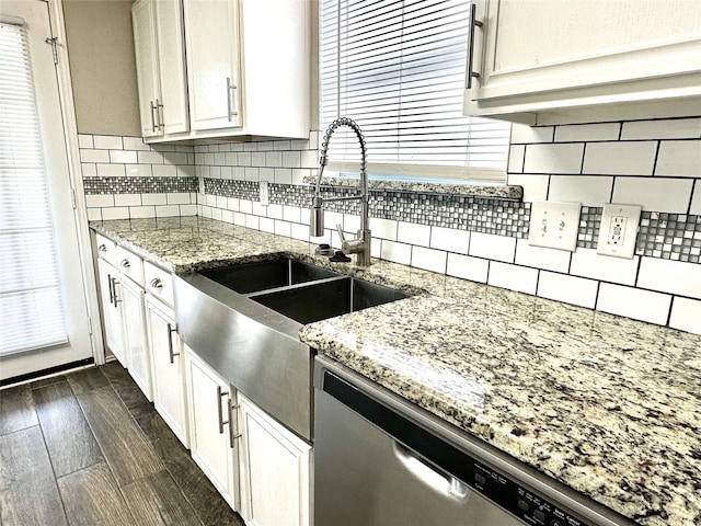 6104 Brookfall Dr, Arlington, TX 76018 - kitchen with dishwasher, decorative backsplash, a sink, white cabinetry, and dark wood-style flooring