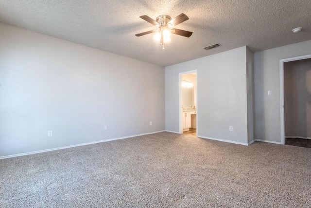 6104 Brookfall Dr, Arlington, TX 76018 - unfurnished bedroom with carpet flooring, a textured ceiling, baseboards, ensuite bath, and ceiling fan