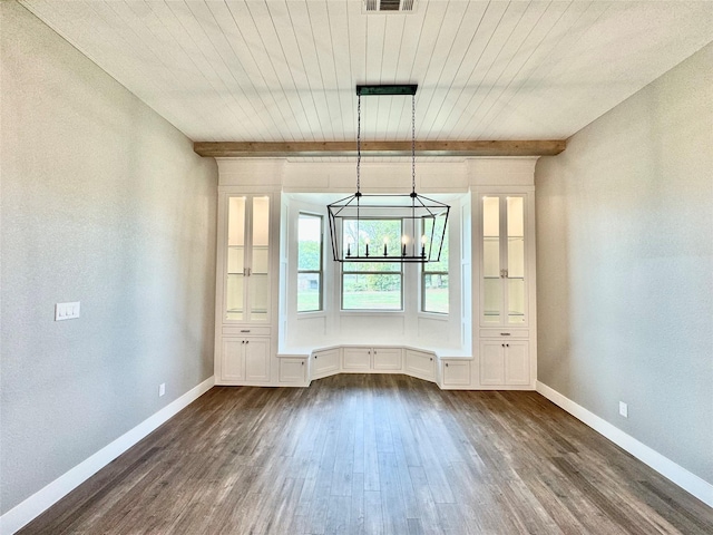 9604 Hester Ln, Argyle, TX 76226 - unfurnished dining area with dark wood finished floors, baseboards, a chandelier, and wooden ceiling with exposed beams