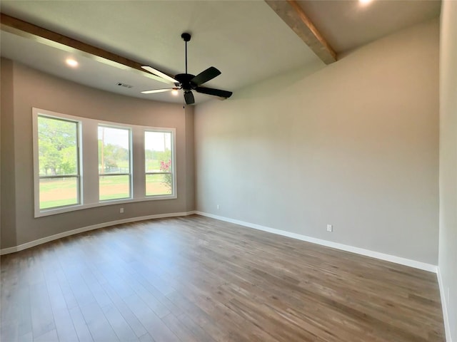 9604 Hester Ln, Argyle, TX 76226 - spare room with beam ceiling, a ceiling fan, baseboards, wood finished floors, and recessed lighting