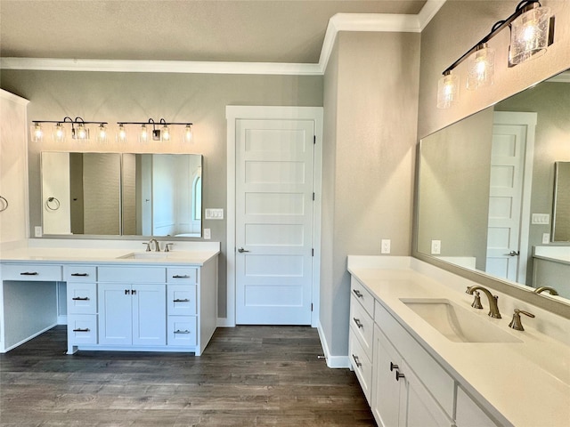 9604 Hester Ln, Argyle, TX 76226 - full bath featuring ornamental molding, wood finished floors, two vanities, and baseboards