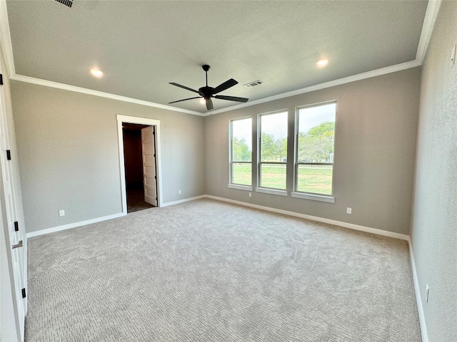 9604 Hester Ln, Argyle, TX 76226 - carpeted empty room featuring crown molding, baseboards, a ceiling fan, and recessed lighting
