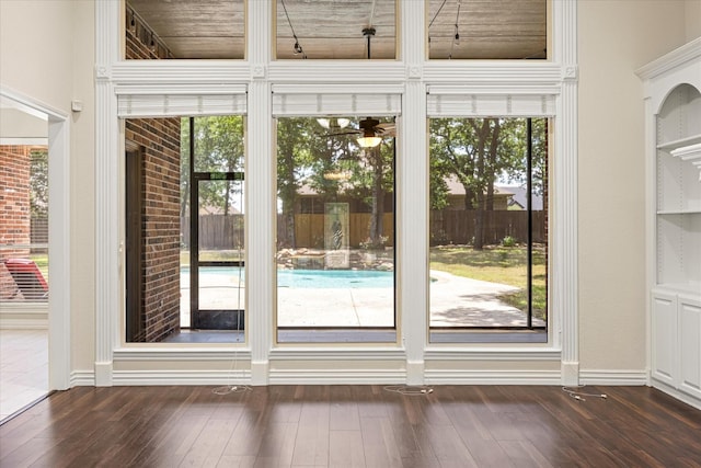 3600 Big Timber Ln, Granbury, TX 76049 - doorway to outside featuring dark wood finished floors and a ceiling fan