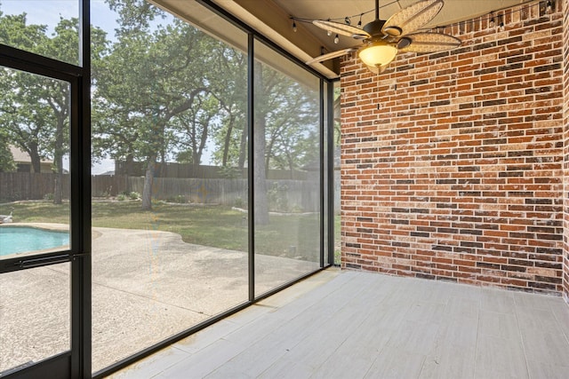 3600 Big Timber Ln, Granbury, TX 76049 - unfurnished sunroom featuring a ceiling fan