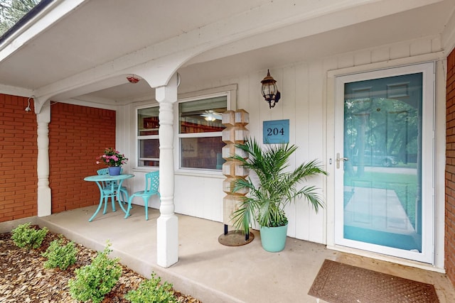 204 Cacti Dr, Lakeside, TX 76108 - doorway to property featuring covered porch and brick siding