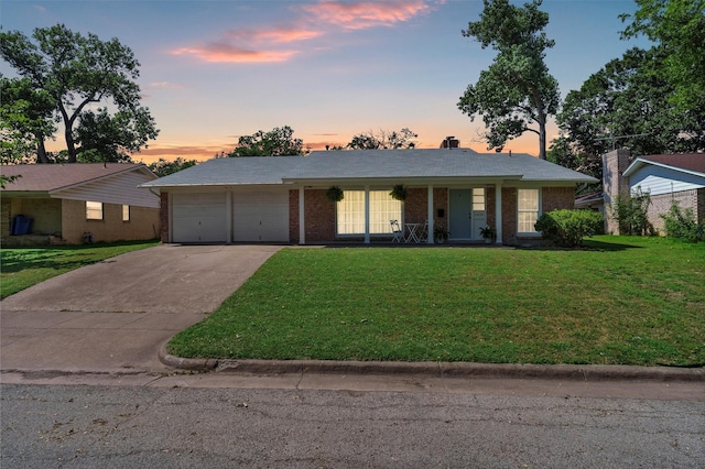 2808 Wren Ave, Fort Worth, TX 76133 - single story home with a garage, brick siding, a yard, driveway, and covered porch