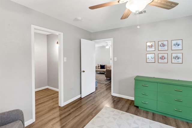 2808 Wren Ave, Fort Worth, TX 76133 - bedroom featuring wood finished floors, baseboards, and ceiling fan