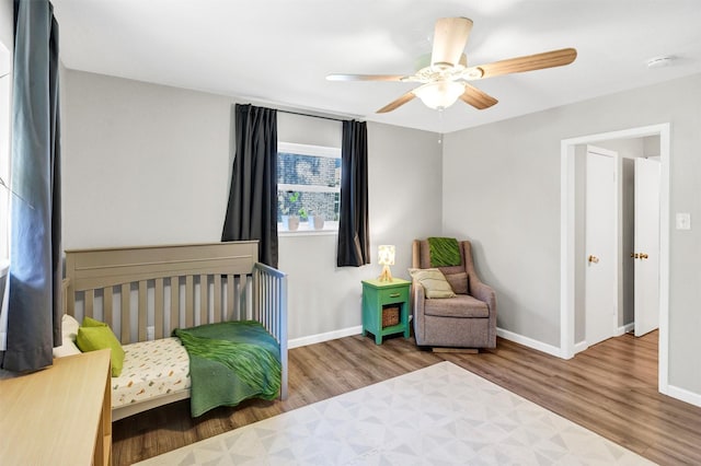 2808 Wren Ave, Fort Worth, TX 76133 - bedroom with wood finished floors, baseboards, and ceiling fan