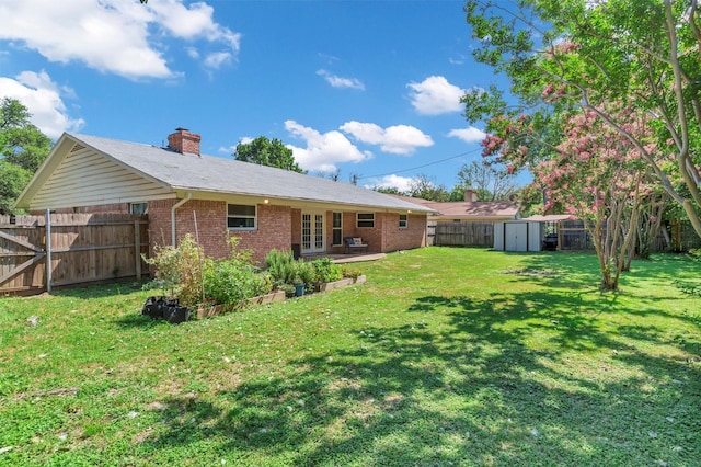 2808 Wren Ave, Fort Worth, TX 76133 - rear view of property featuring brick siding, french doors, a patio, and a chimney