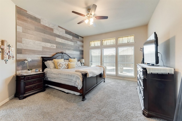 3113 Summer Dr, Little Elm, TX 75068 - carpeted bedroom featuring wood walls and ceiling fan