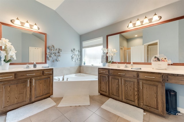 3113 Summer Dr, Little Elm, TX 75068 - full bath with vaulted ceiling, a bath, tile patterned floors, vanity, and a shower stall
