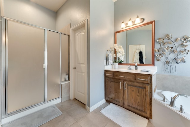3113 Summer Dr, Little Elm, TX 75068 - full bath featuring a shower stall, vanity, a garden tub, and tile patterned flooring