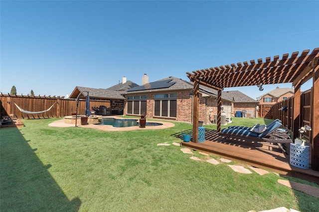 3113 Summer Dr, Little Elm, TX 75068 - view of yard with a wooden deck, a pergola, and a pool with connected hot tub