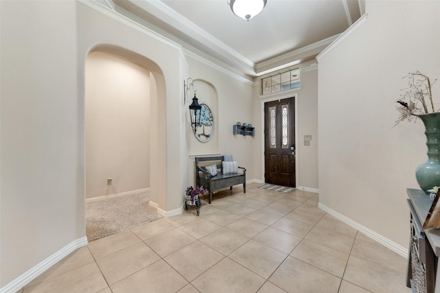 3113 Summer Dr, Little Elm, TX 75068 - entryway featuring arched walkways, light tile patterned floors, ornamental molding, and baseboards