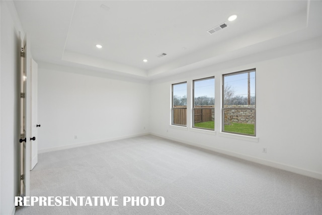 4180 Kestrel St, Prosper, TX 75078 - unfurnished room featuring a raised ceiling, light carpet, recessed lighting, and baseboards