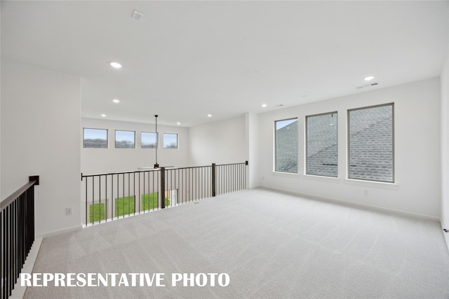 4180 Kestrel St, Prosper, TX 75078 - carpeted empty room featuring recessed lighting, healthy amount of natural light, a ceiling fan, and baseboards