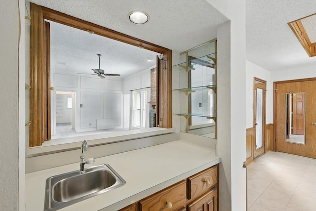 220 Simmons Dr, Coppell, TX 75019 - bathroom with a textured ceiling, ceiling fan, and vanity