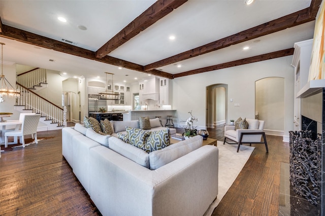 4012 Colgate Ave, University Park, TX 75225 - living room with arched walkways, stairway, recessed lighting, beam ceiling, and baseboards