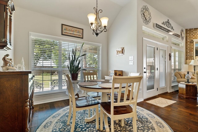 768 Northside Dr, Pilot Point, TX 76258 - dining room featuring plenty of natural light, dark wood-style floors, a chandelier, and lofted ceiling