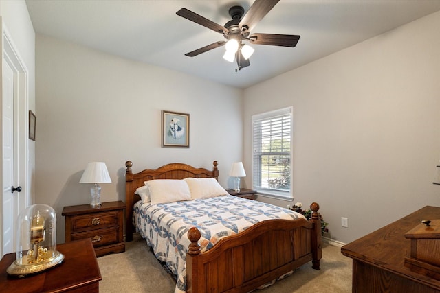 768 Northside Dr, Pilot Point, TX 76258 - bedroom featuring light carpet, a ceiling fan, and baseboards