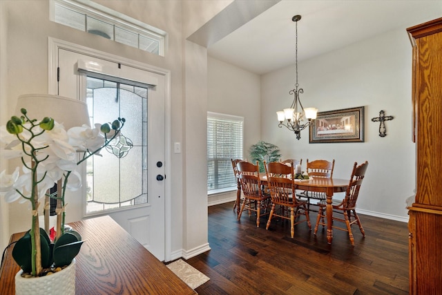 768 Northside Dr, Pilot Point, TX 76258 - dining area featuring dark wood-style floors, a chandelier, and baseboards