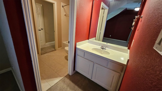 6944 Bridgemarker Dr, Grand Prairie, TX 75054 - bathroom with toilet, a textured wall, vanity, tile patterned flooring, and shower / bath combination