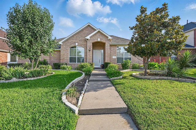 3609 Edwards Dr, Plano, TX 75025 - traditional-style home with brick siding and a front lawn