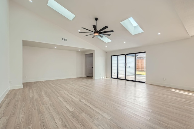 16212 Spring Creek Rd, Dallas, TX 75248 - empty room with a skylight, high vaulted ceiling, light wood-style flooring, baseboards, and recessed lighting