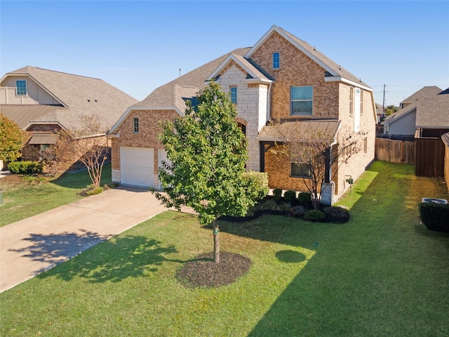 1409 Rose Bud Ct, Little Elm, TX 75068 - traditional-style house featuring concrete driveway, brick siding, and a standing seam roof