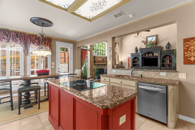 7904 Linksview Dr, Mckinney, TX 75072 - kitchen featuring stainless steel dishwasher, a sink, black electric cooktop, crown molding, and a fireplace