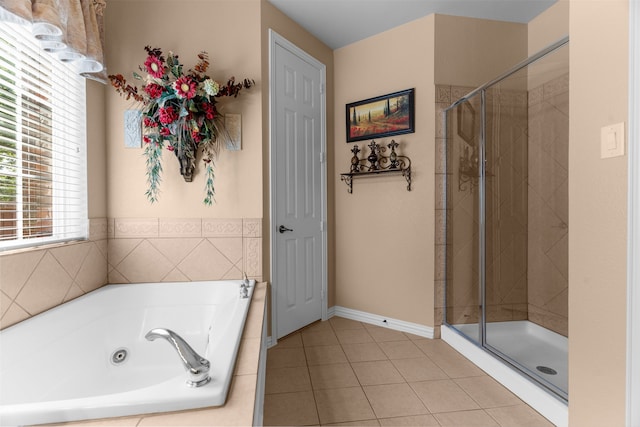 7904 Linksview Dr, Mckinney, TX 75072 - bathroom with a tub with jets, a shower stall, tile patterned floors, and baseboards