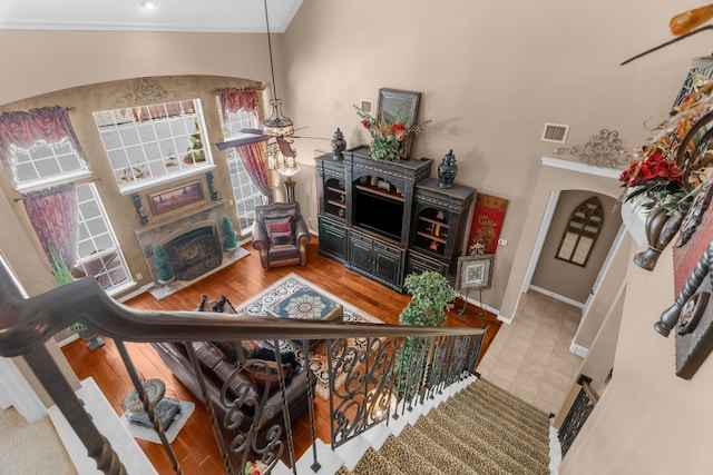 7904 Linksview Dr, Mckinney, TX 75072 - living room with ornamental molding, a high end fireplace, ceiling fan, and baseboards
