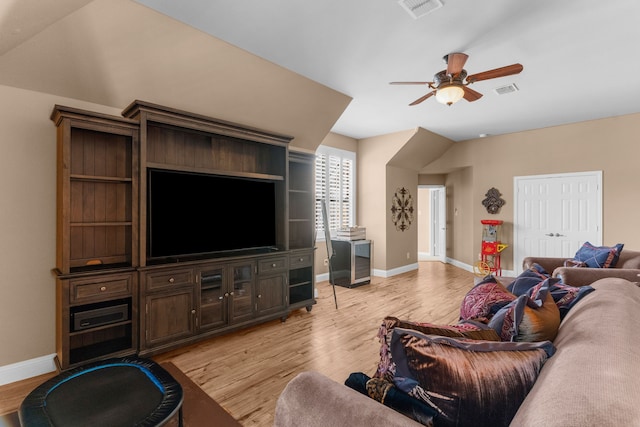 7904 Linksview Dr, Mckinney, TX 75072 - living area featuring light wood-style floors, a ceiling fan, and baseboards
