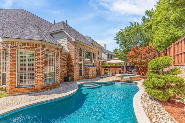 7904 Linksview Dr, Mckinney, TX 75072 - view of swimming pool featuring a patio area, a fenced backyard, and a pool with connected hot tub